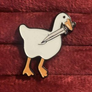 Duck with a dagger pin 