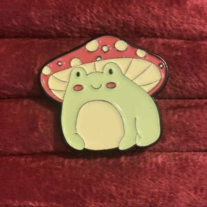 Frog in a mushroom hat pin 