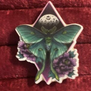 Green moth pin