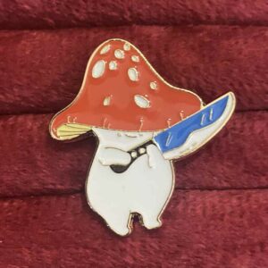 Mushroom with a knife pin