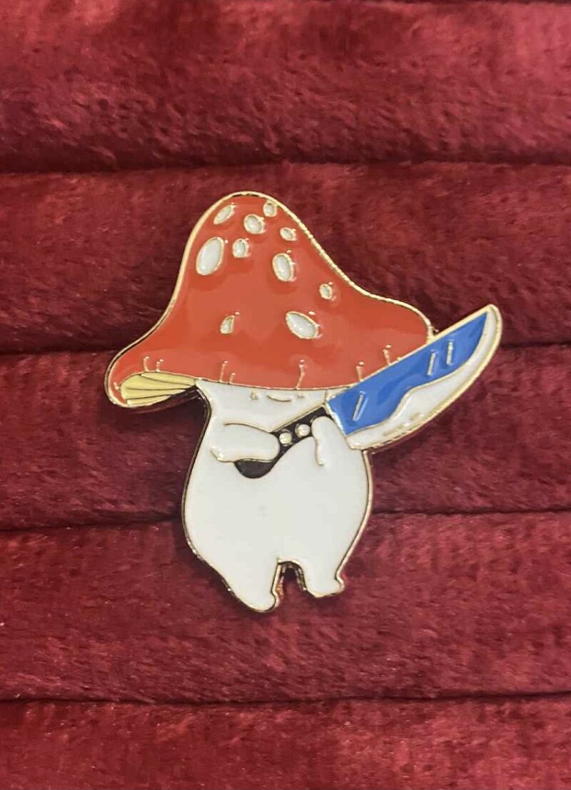 Mushroom with a knife pin