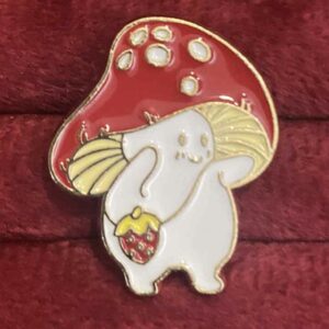Mushroom with a strawberry pin