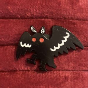 Moth man pin