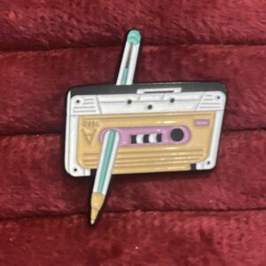 Music tape pin