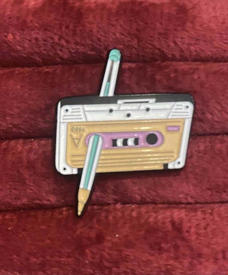 Music tape pin