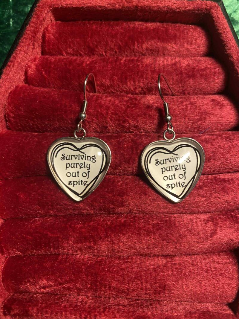 Surviving purely out of spite earrings
